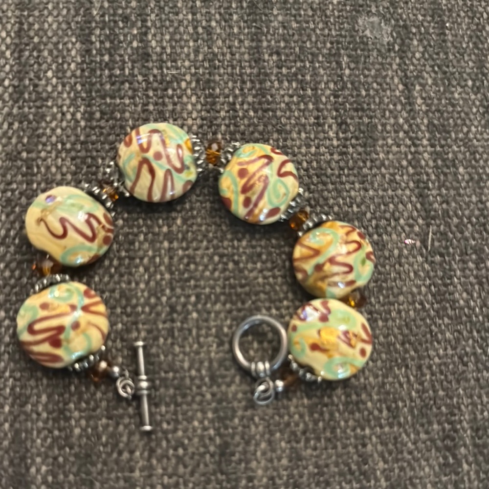 Yellow and Green Beaded Bracelet with Swirled Patterns